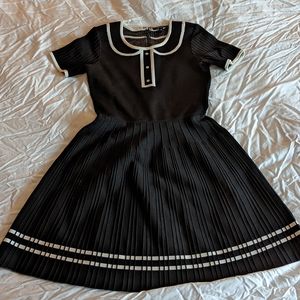 Pink Tartan, small dress in black with white details.